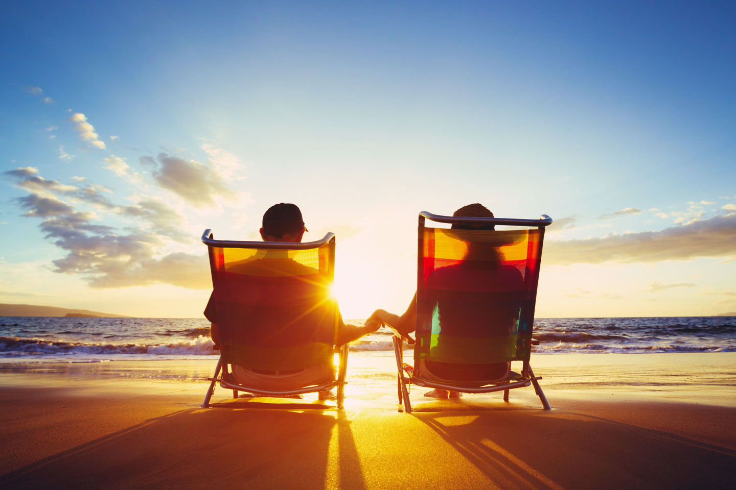 Retirement Vacation Concept, Mature Coupe Watching the Sunset Retirement Vacation