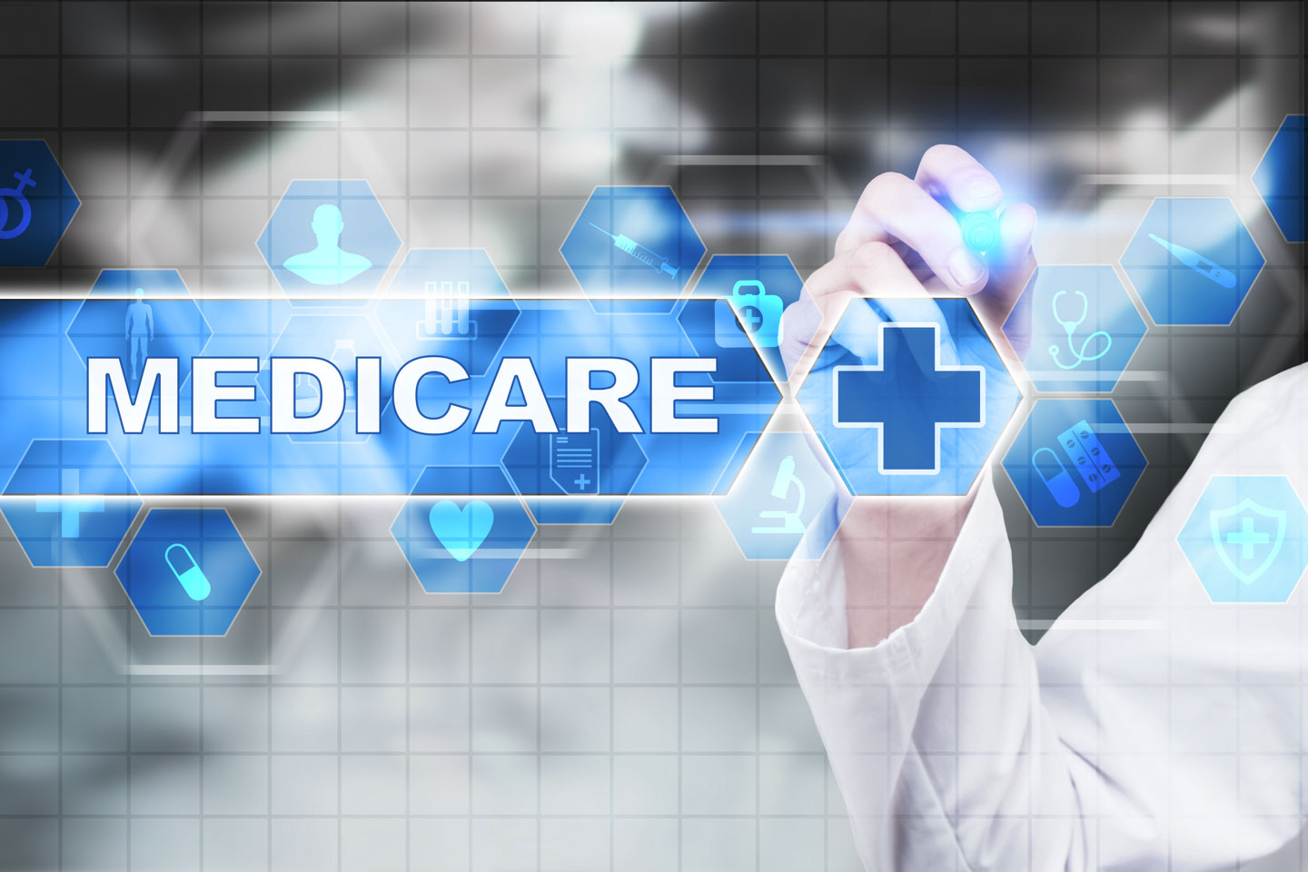 Medical doctor drawing medicare on the virtual screen. medicare sign